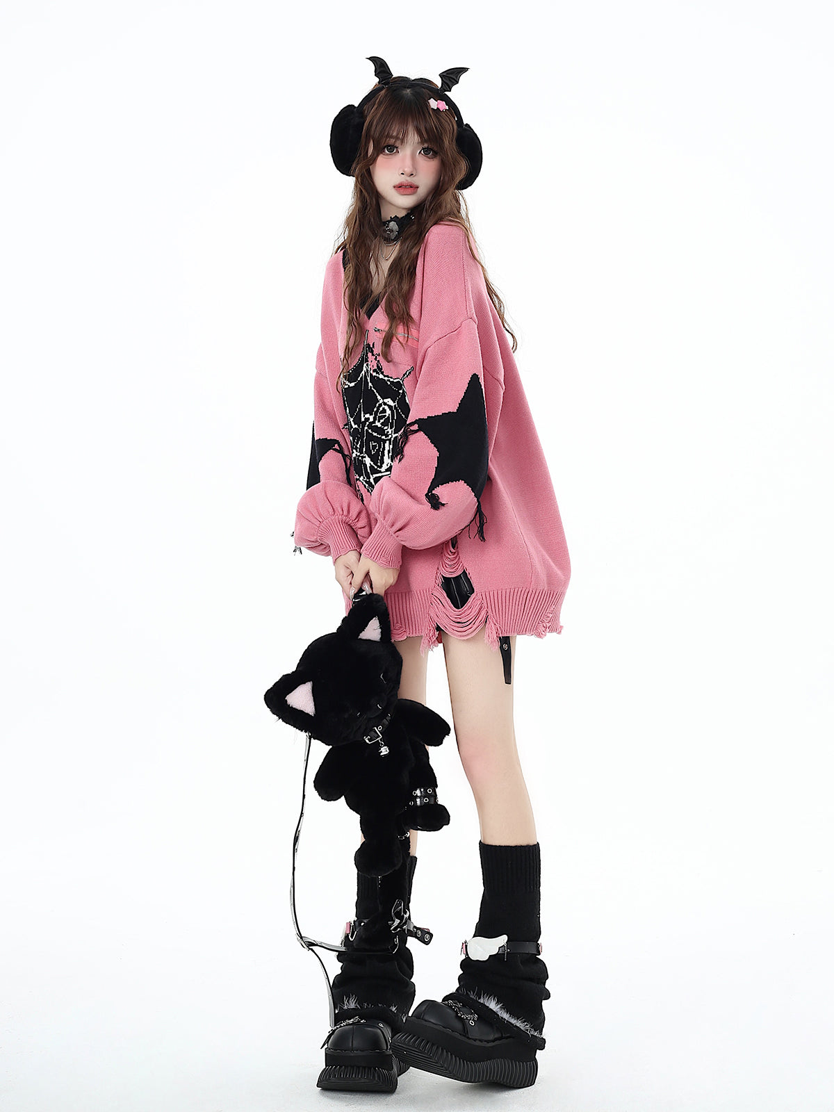 クモの巣と星柄ニットセーター