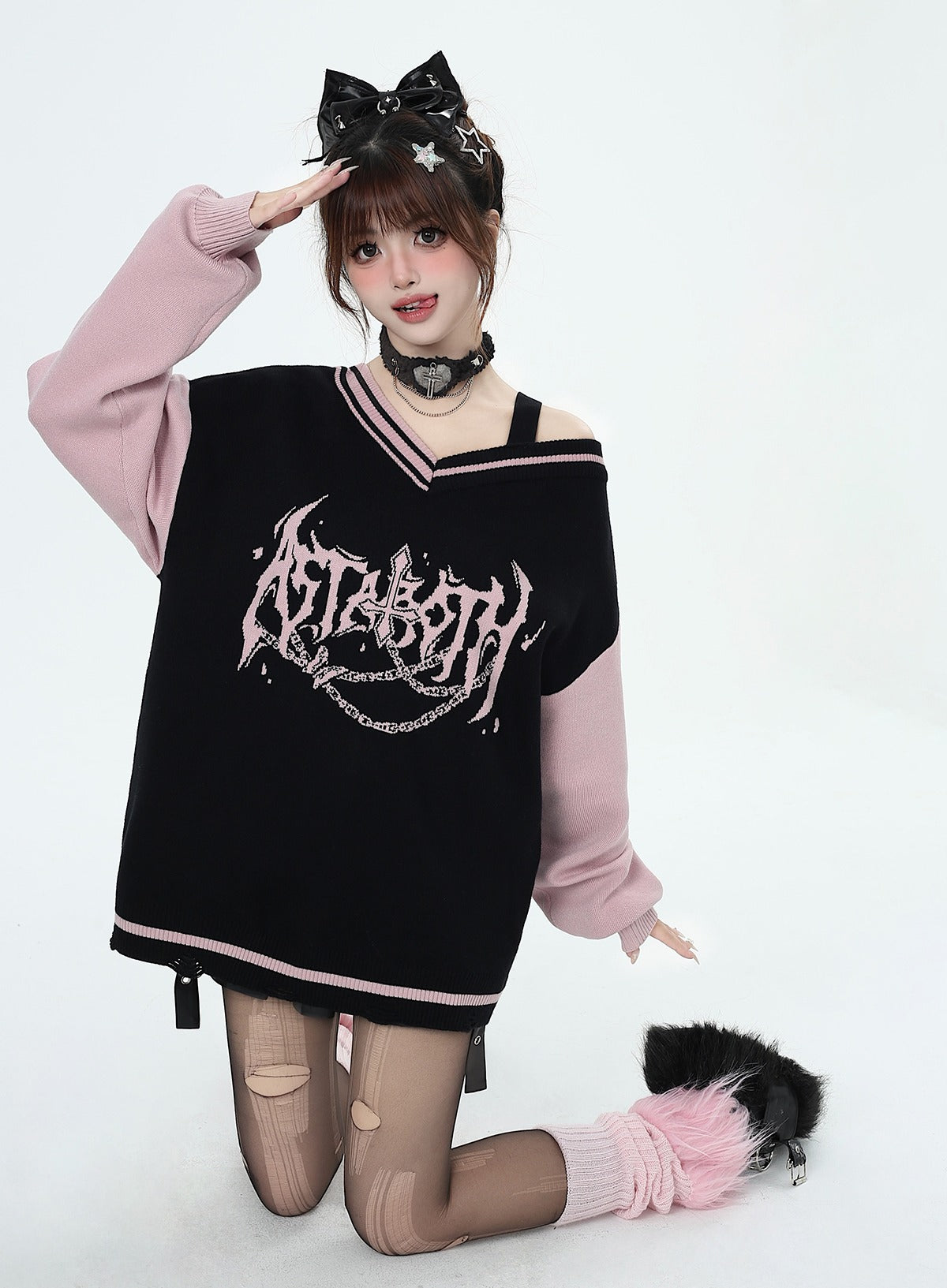 Black and pink V-neck off-shoulder sweater