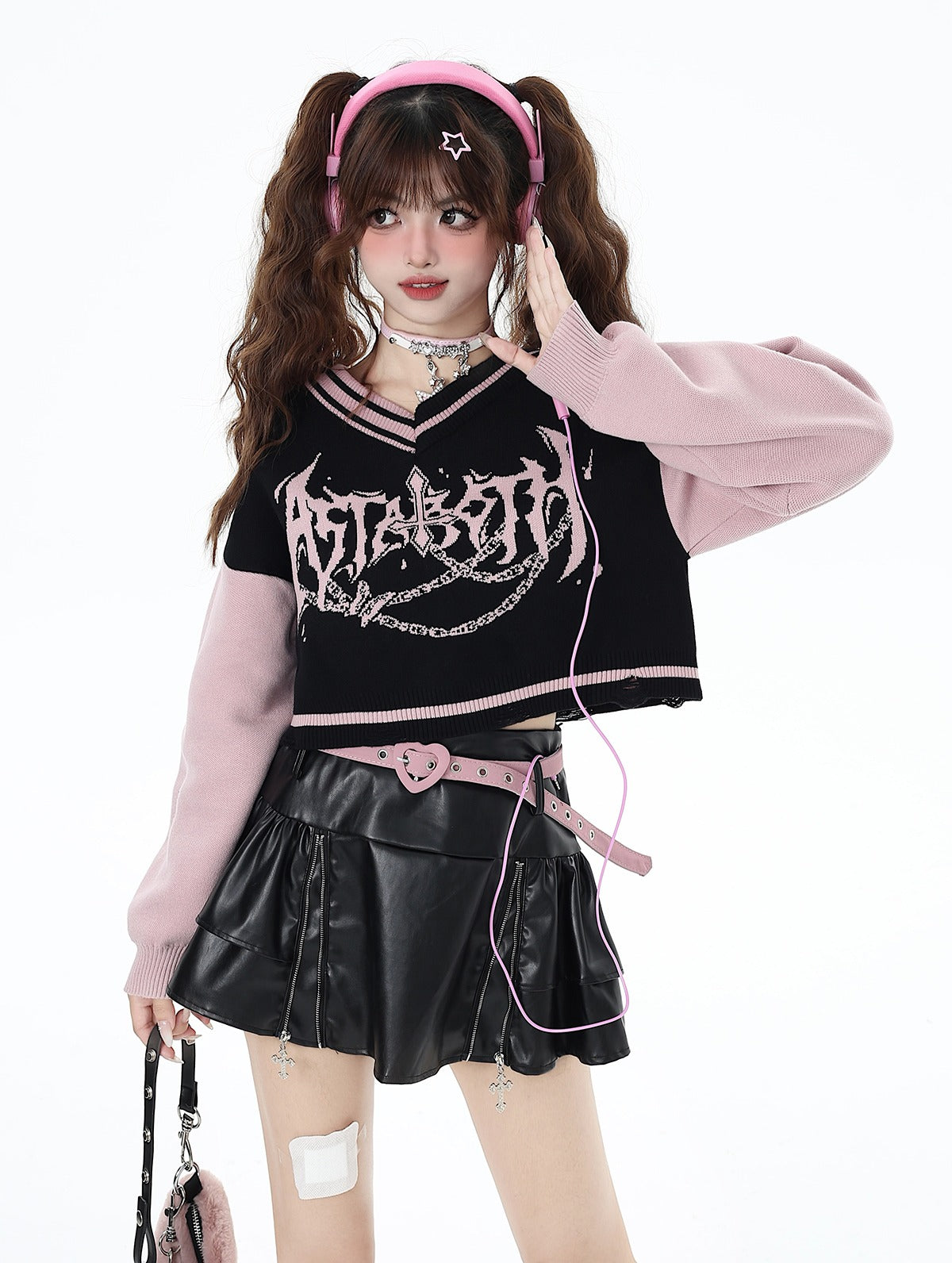 Black and pink V-neck off-shoulder sweater