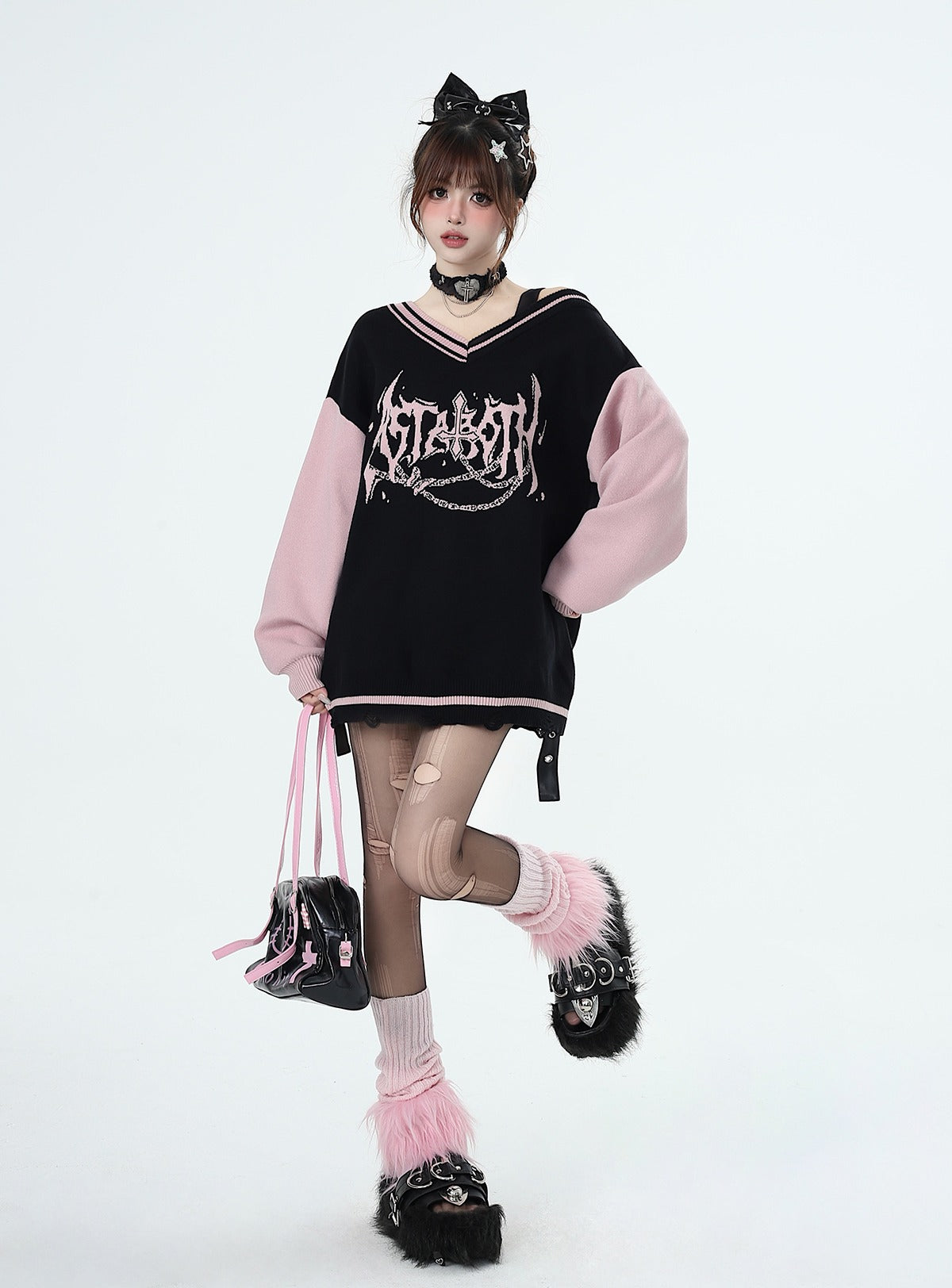 Black and pink V-neck off-shoulder sweater