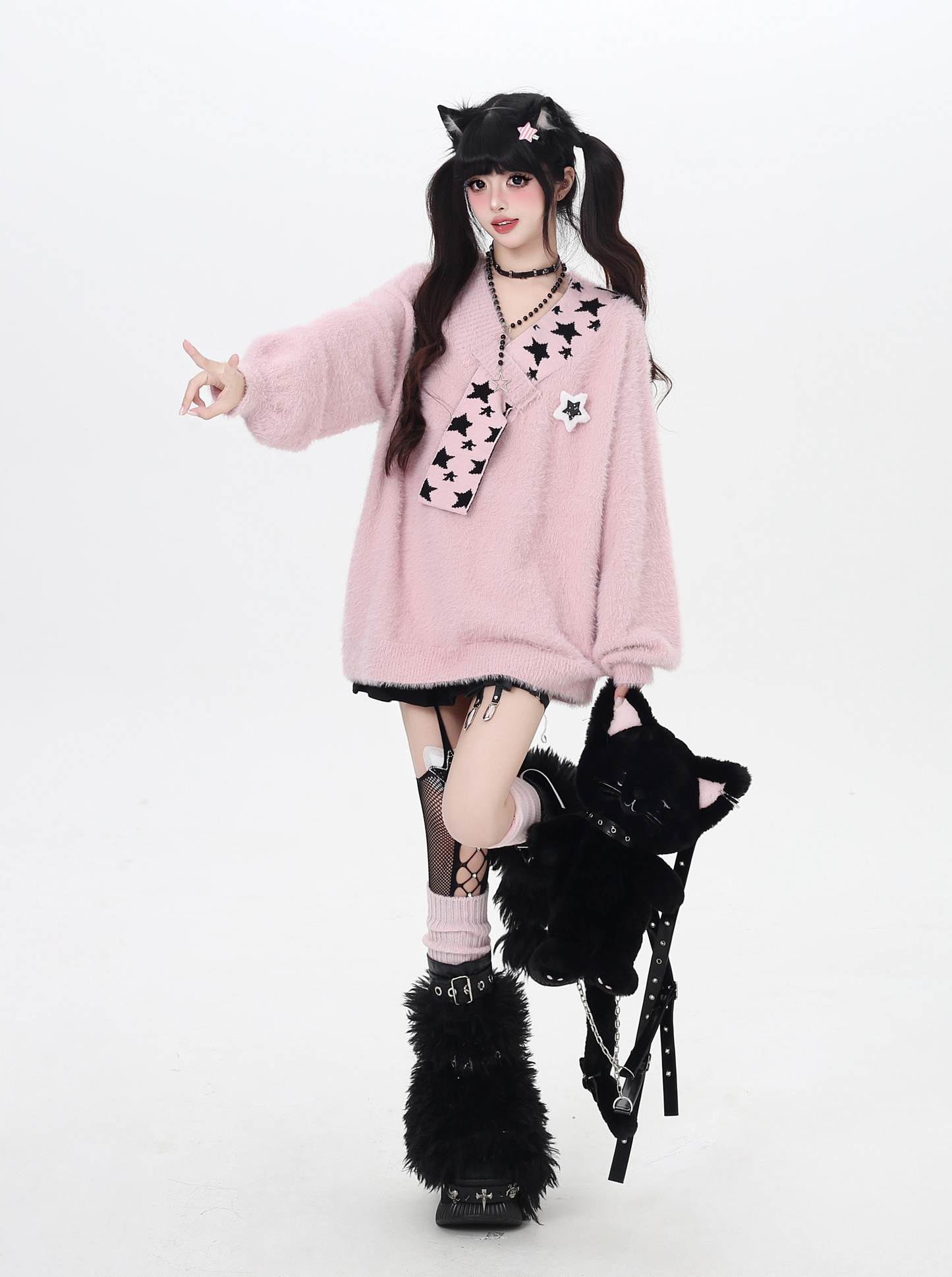 星モチーフフェイクファー重ね着風ニット