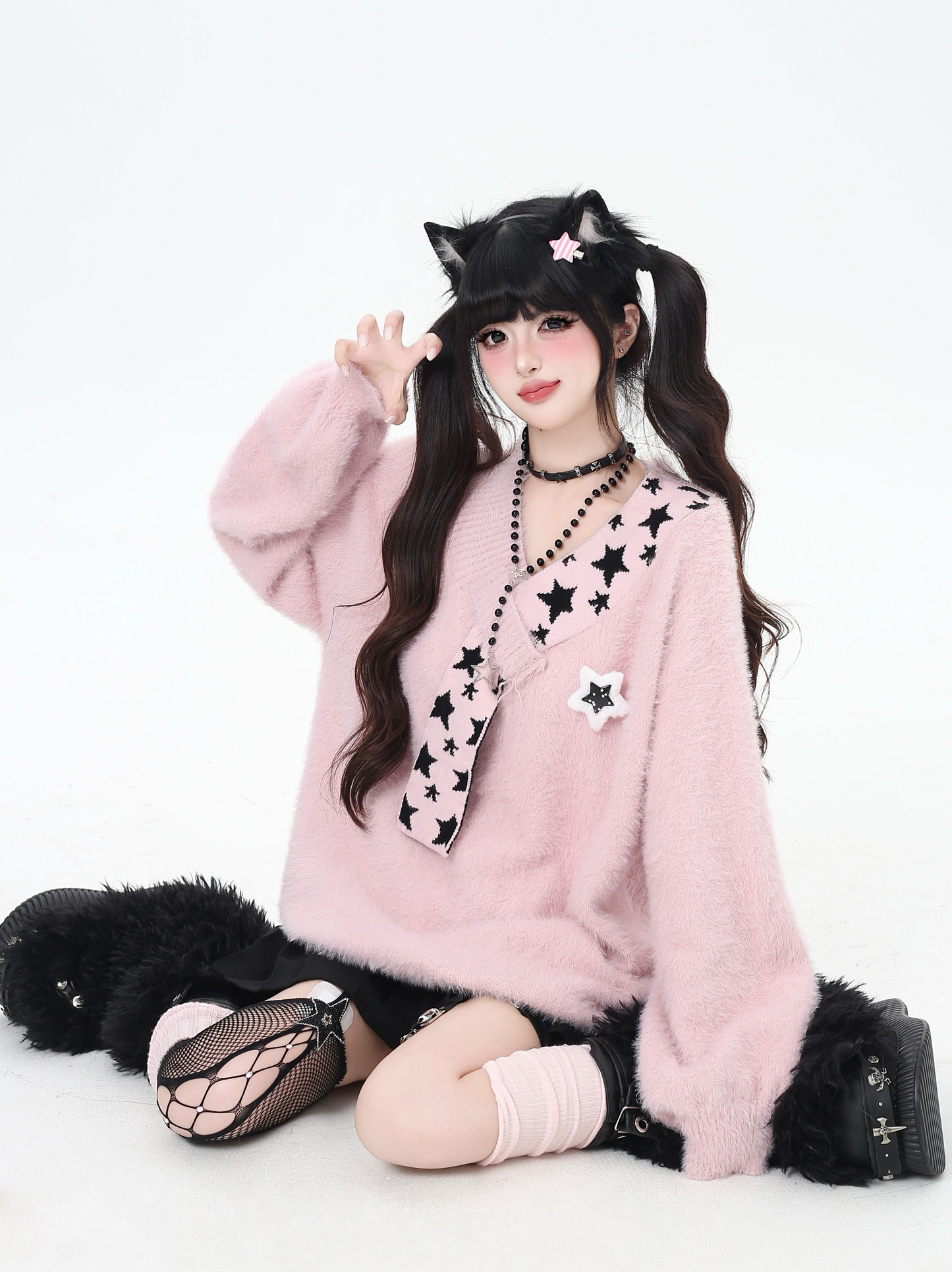 星モチーフフェイクファー重ね着風ニット