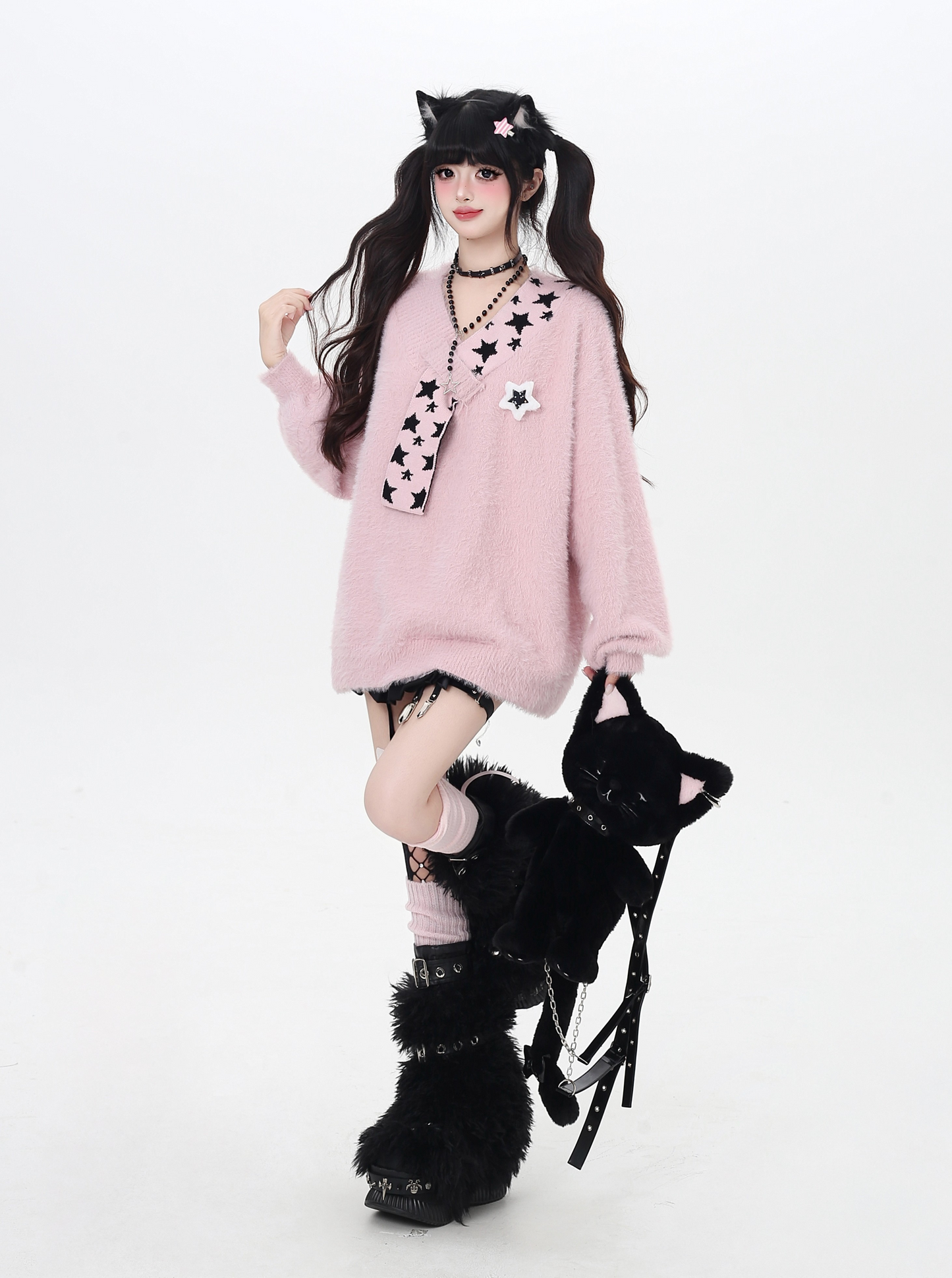 星モチーフフェイクファー重ね着風ニット