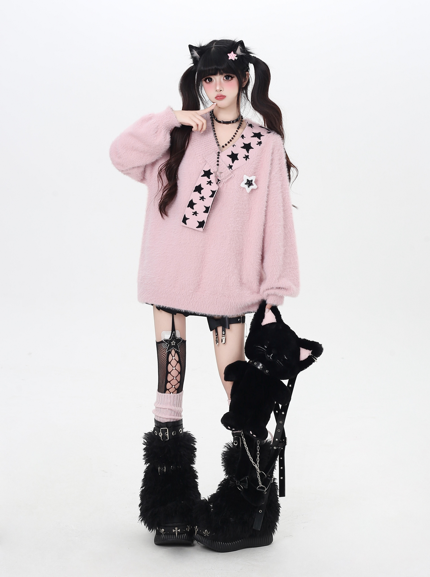 星モチーフフェイクファー重ね着風ニット